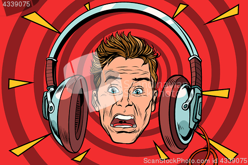 Image of A scared man wearing headphones