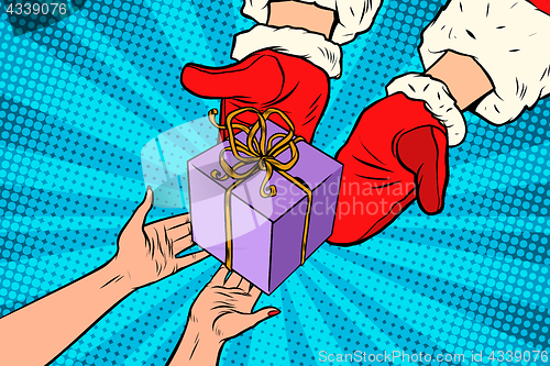 Image of Santa Claus gives Christmas gift