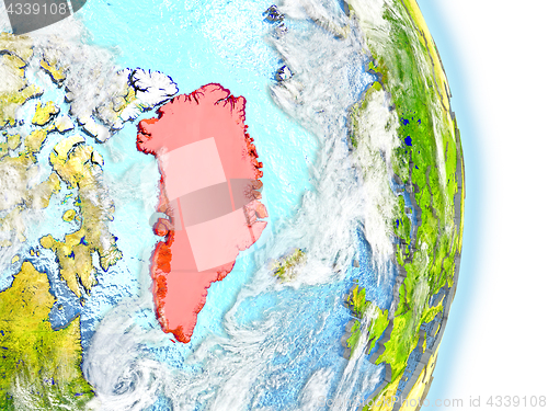 Image of Greenland in red on Earth