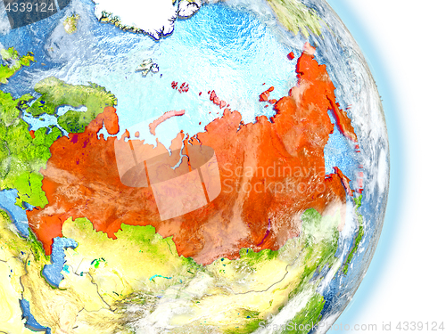 Image of Russia in red on Earth