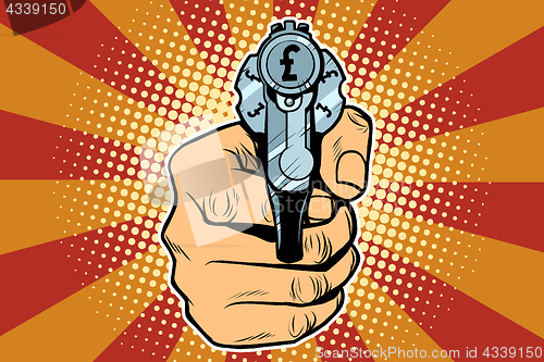 Image of pound currency money Finance revolver in hand