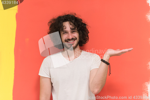 Image of young man with funny hair over color background