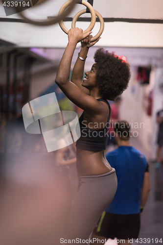Image of black woman doing dipping exercise