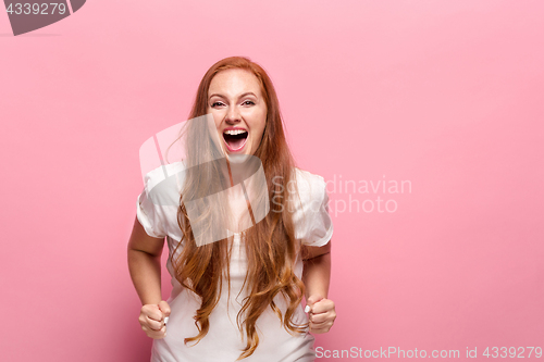 Image of Portrait of young woman with happy facial expression