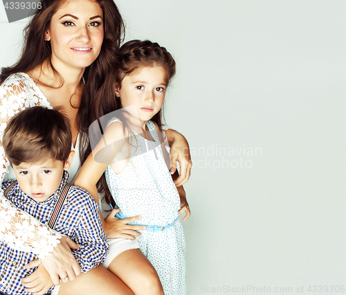 Image of young mother with two children on white, happy smiling family in