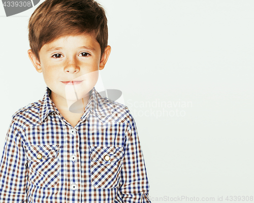 Image of young pretty little cute boy kid wondering, posing emotional face isolated on white background, gesture happy smiling close up, lifestyle real people concept