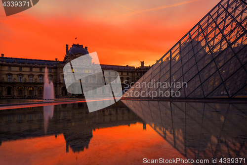 Image of View of famous Louvre Museum with Louvre Pyramid