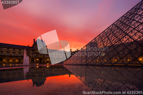 Image of View of famous Louvre Museum with Louvre Pyramid