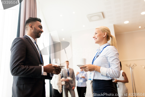 Image of happy business team at international conference