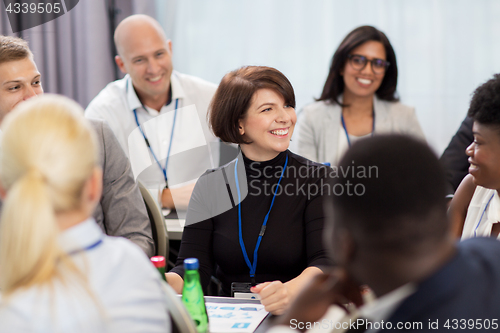 Image of happy business team at international conference