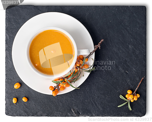 Image of Tea of seabuckthorn on slate stone