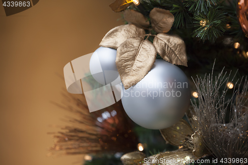 Image of christmas balls with a brown background