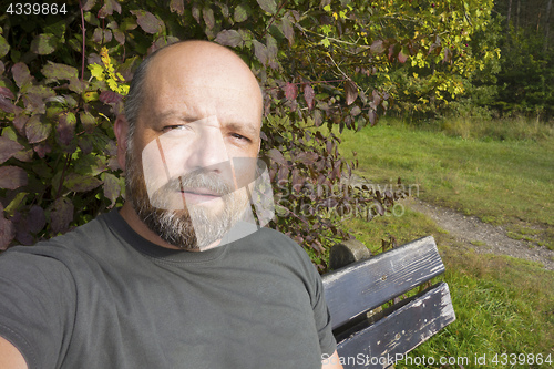 Image of man having a rest outdoors