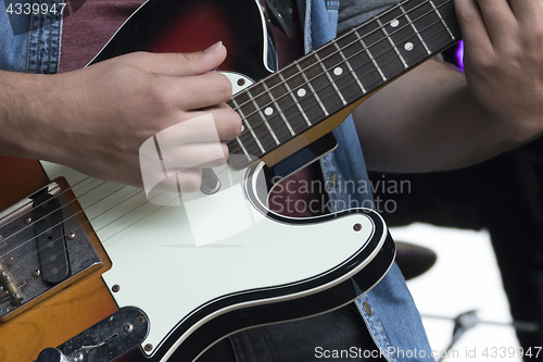 Image of Guitar Player