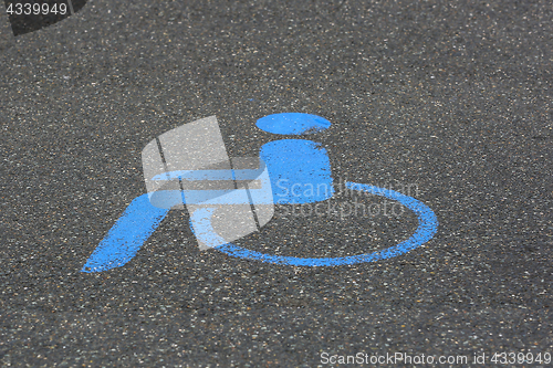 Image of Handicapped parking icon on asphalt