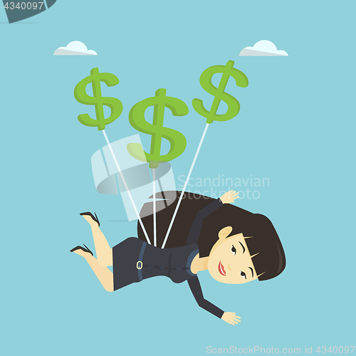 Image of Business woman flying with dollar signs.