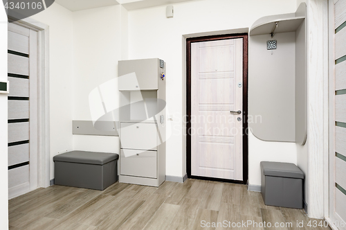 Image of Apartment hallway with door and closet