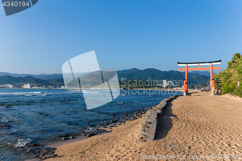 Image of Red torii in Aoshima Shrine with blue sky