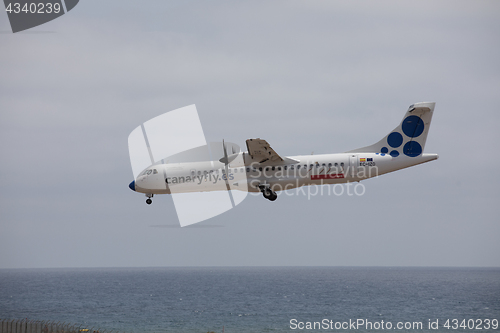 Image of ARECIFE, SPAIN - APRIL, 15 2017: ATR 72 of CANARYFLY.es landing 
