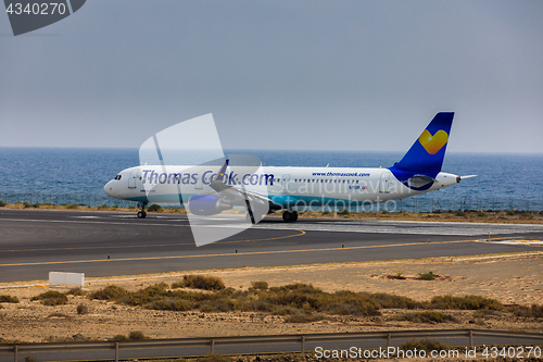 Image of ARECIFE, SPAIN - APRIL, 16 2017: AirBus A321 of ThomasCook.com w