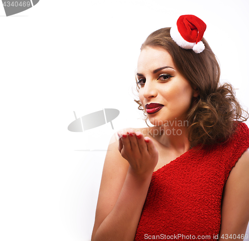 Image of young pretty happy smiling brunette woman on christmas in santas