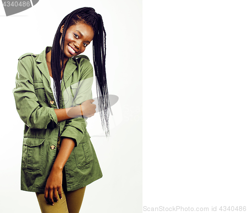 Image of young pretty african-american girl posing cheerful emotional on 