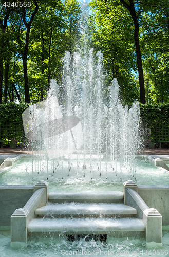 Image of Fountain pyramid in summer garden. Saint Petersburg