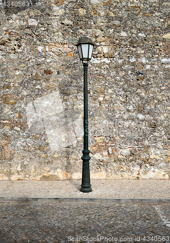 Image of Streetlamp and old building