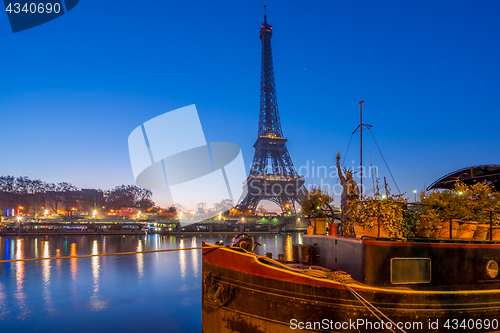 Image of The Eiffel tower at sunrise in Paris