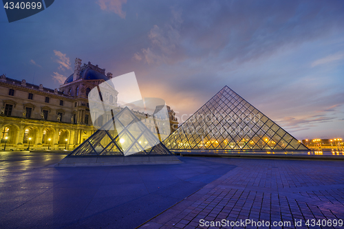 Image of View of famous Louvre Museum with Louvre Pyramid