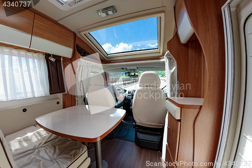 Image of Man driving on a road in the Camper Van RV