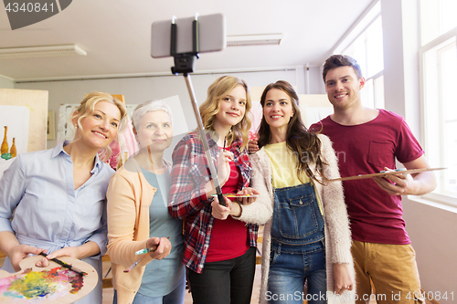 Image of group of artists taking selfie at art school