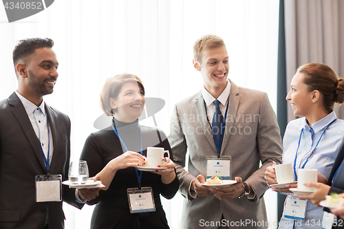 Image of happy business team at international conference