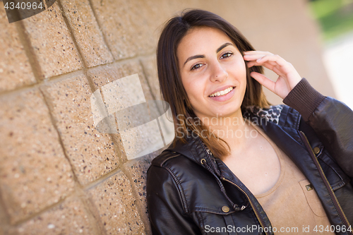 Image of Beautiful Happy Mixed Race Young Woman Portrait Outside.