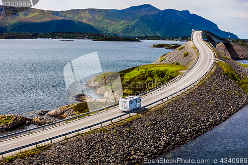 Image of Caravan car RV travels on the highway Atlantic Ocean Road Norway