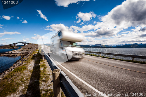 Image of Caravan car RV travels on the highway Atlantic Ocean Road Norway