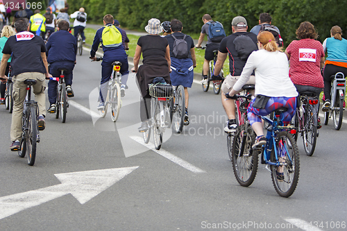 Image of Bicyclists in traffic public transport in the city