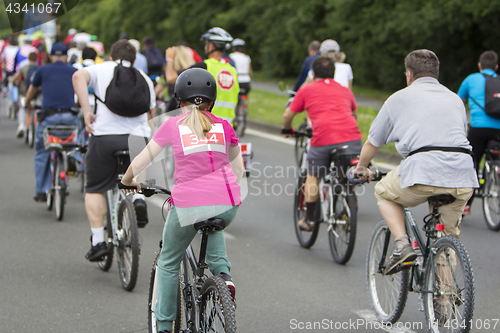 Image of Bicyclists in traffic public transport in the city