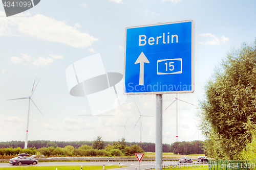 Image of Traffic sign with direction to Berlin