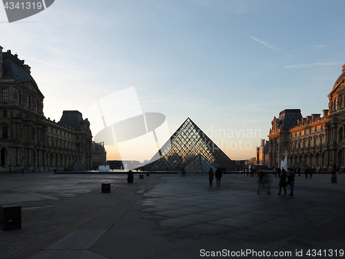 Image of View of famous Louvre Museum with Louvre Pyramid