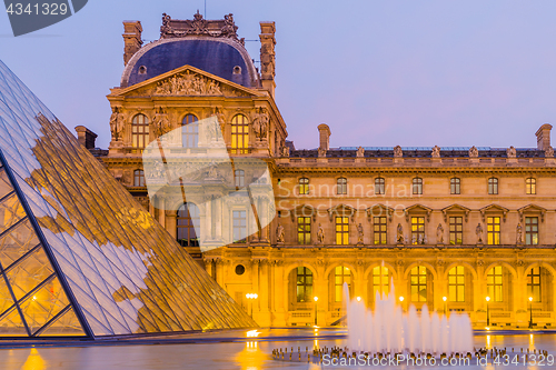 Image of View of famous Louvre Museum with Louvre Pyramid