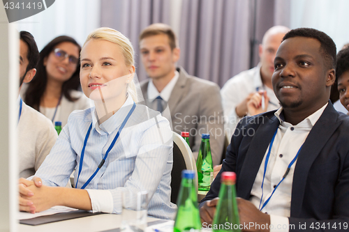 Image of happy business team at international conference