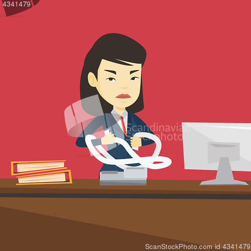 Image of Angry business woman tearing bills or invoices.