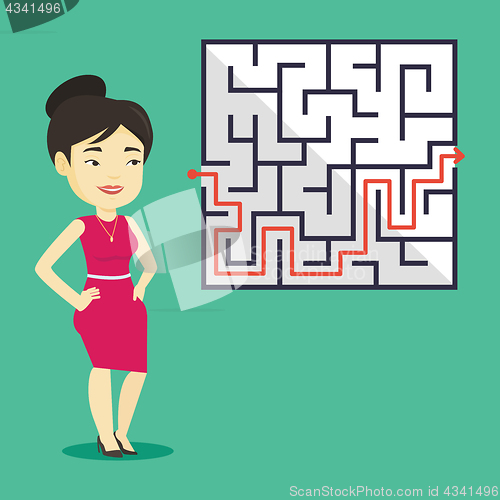 Image of Business woman looking at labyrinth with solution.