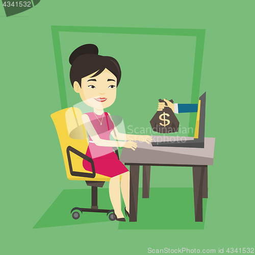 Image of Businesswoman earning money from online business.