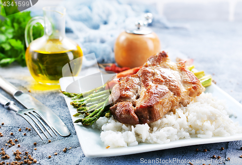 Image of rice with asparagus and meat