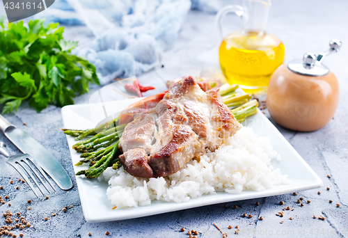 Image of rice with asparagus and meat