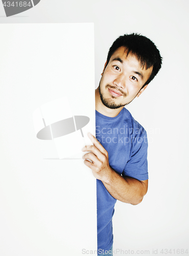 Image of pretty cool asian man holding empty white plate smiling