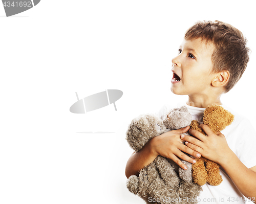 Image of little cute boy with many teddy bears hugging isolated close up