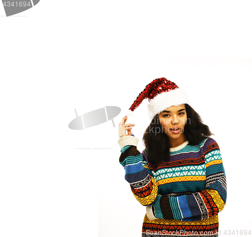 Image of cute young girl in santas red hat isolated